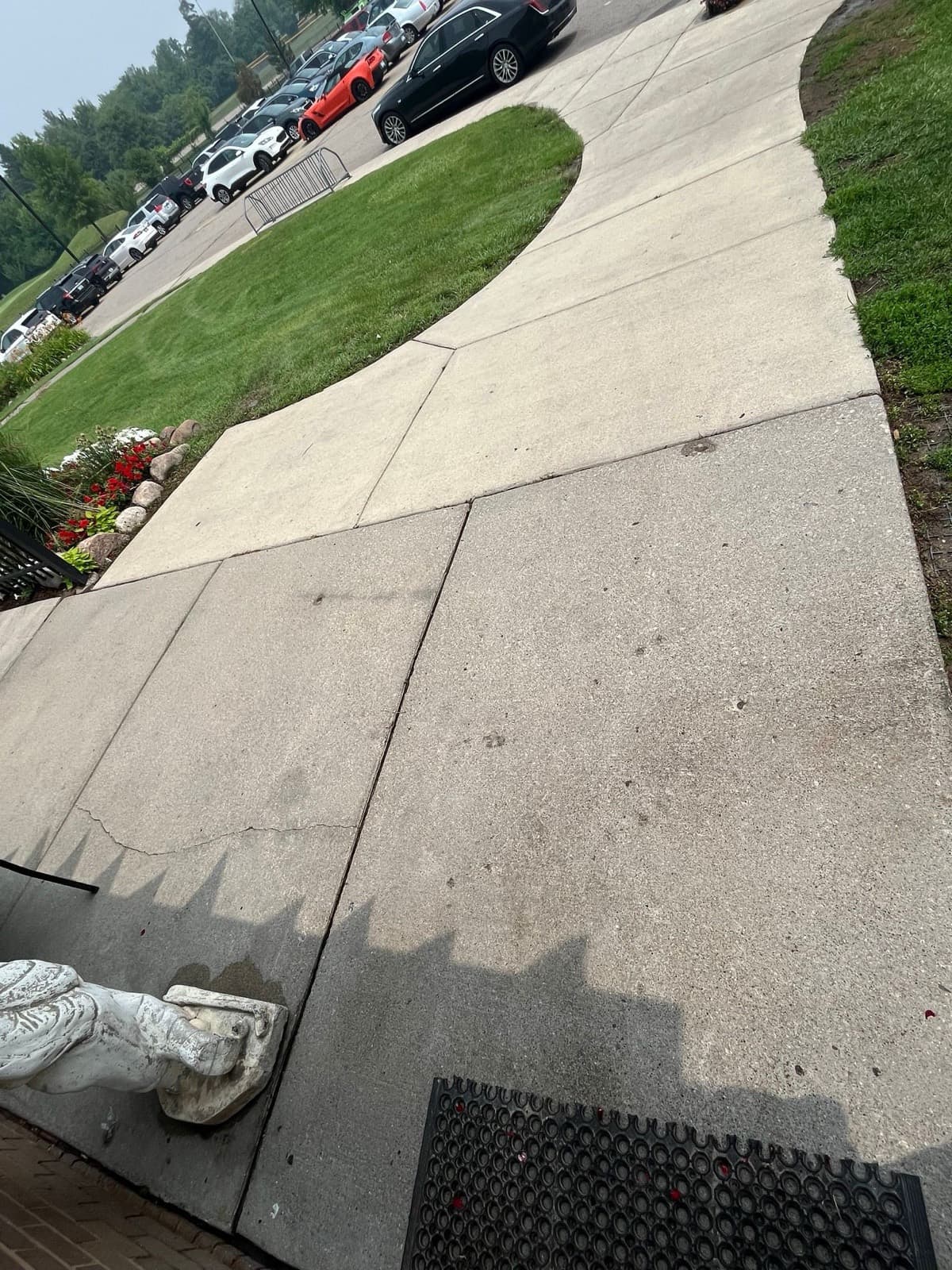 Commercial sidewalk clean after pressure washing
