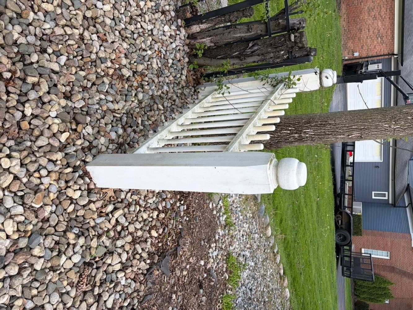 Same fence post bright white after pressure washing