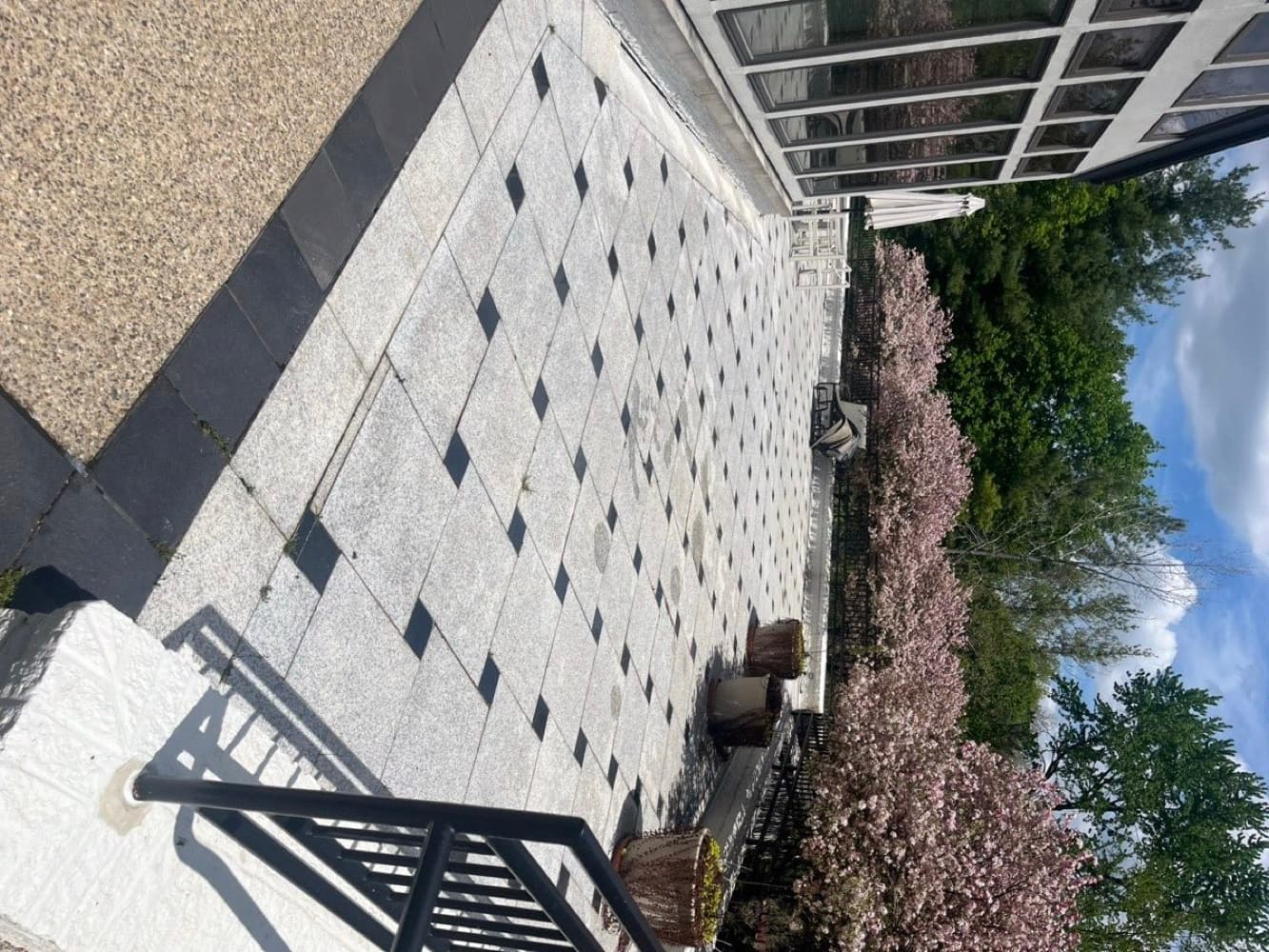 Same stone paver patio clean and bright after pressure washing