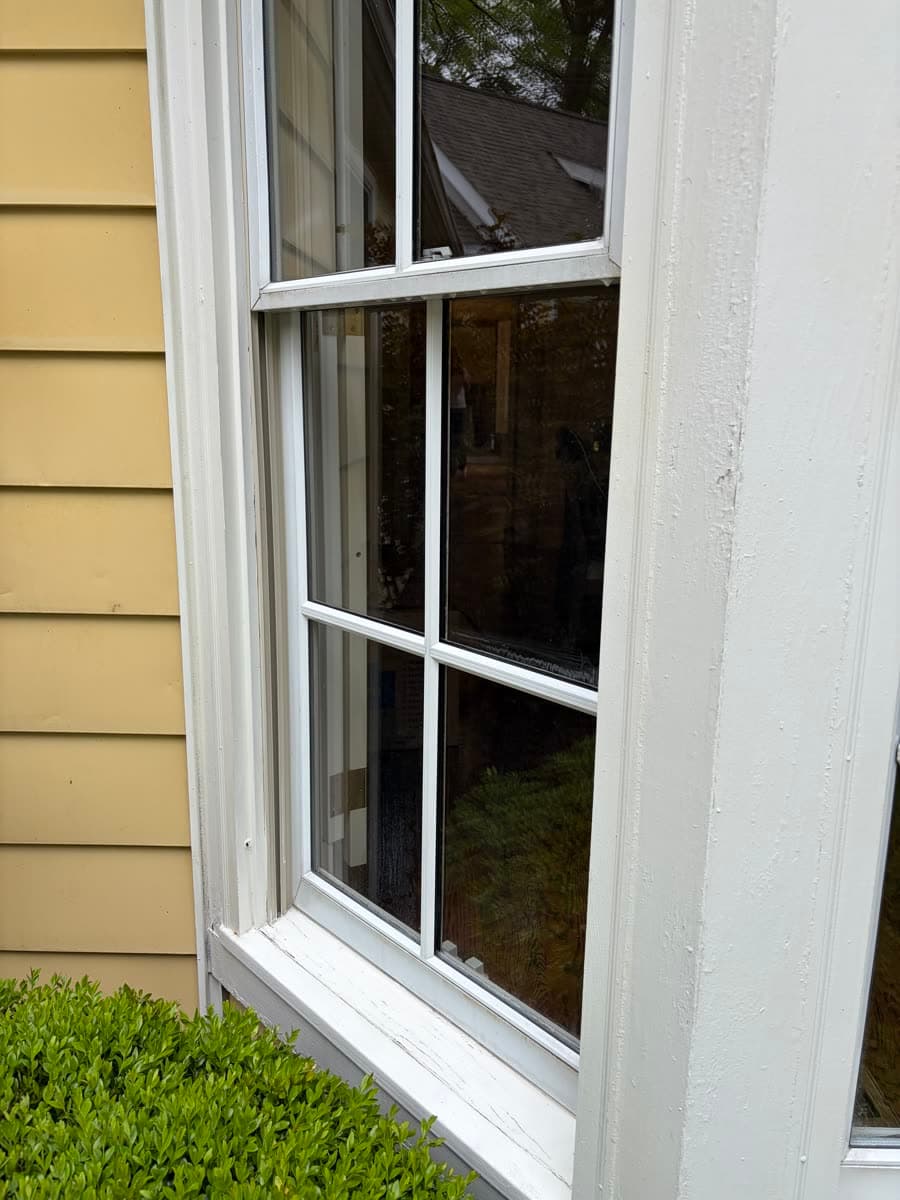 Same double-hung window with clear glass after cleaning
